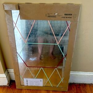 Mirror from IKEA never opened. Great for vanity or bedroom.